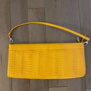 HOBO international. Quilted leather clutch with strap